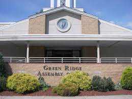 Clarks green assembly of god shop